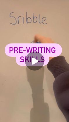 a person writing on a whiteboard with the words pre - writing skills below it