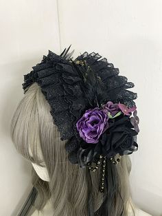 Elevate your Gothic Lolita look with this stunning bead chains gothic rosette design feather KC in black/black and purple. This single KC features intricate bead chains, a bold rosette design, and eye-catching feathers in a striking color combination of black. Perfect for adding a touch of dark elegance to your outfit, this accessory is a must-have for any Lolita fashion enthusiast.   Please note that only the KC is included, other items are not part of the package. Black Punk Headpiece For Party, Black Gothic Headpiece For Party, Adjustable Black Punk Headpiece, Elegant Black Festival Headpieces, Black Punk Headpieces For Alternative Fashion, Black Gothic Headpiece For Alternative Fashion, Gothic Black Headpiece For Alternative Fashion, Black Fantasy Headpieces For Alternative Fashion, Elegant Black Costume Headpiece