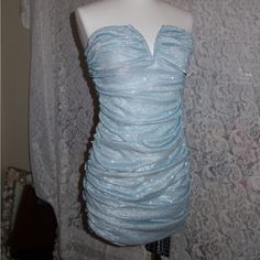 Brand New Fashion Nova Mini Blue Ruched Dress. This Glittery Baby Blue Dress Is Perfect For A Night Out! It Does Have Stretch. Zipper & Hook And Eye Closure #Fashionnova #Dress #Blue #Nightout #Glittery Light Blue Sparkly Dress Short Tight, Baby Blue Dress Hoco, Baby Blue Sparkly Dress, Light Blue Ruched Mini Dress For Party, Blue Mini Dress With Ruched Bodice For Night Out, Blue Hoco Dresses Short, Blue Hoco Dress Short, Icy Blue Dress, Silver Blue Dress