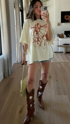 Tall Tan Cowboy Boots Outfit, Tan T Shirt Outfit, T Shirt Cowboy Boots Outfit, Baggy Shirt And Cowboy Boots, Texas Outfits Summer, Oversized Tee And Cowboy Boots, Tan Cowboy Boots Outfit, Big Tshirt Cowboy Boots, Oversized Tee Cowboy Boots