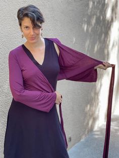 Our classic ballet wrap shrug has slight bell sleeves and can be worn as a light layer over any tank, dress, or on its own. One Size (O/S) Wrap Top Outfit, Ballet Wrap Sweater, Wrap Shrug, Ballet Wrap Top, Ballet Fashion, Top Outfit, Natural Curves, Draped Fabric, Wrap Sweater