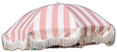 a pink and white striped umbrella with tassels on the bottom, sitting in front of a white background