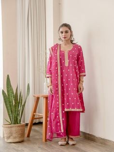 Madhu - Pink Floral Embroidered Cotton Palazzo Kurta Set (Set of 3) By Gulabo Jaipur now available at Trendroots Unstitched Palazzo Set With Resham Embroidery And Straight Kurta, Designer Wear Straight Kurta Set With Gota Work, Designer Wear Sets With Gota Work, Designer Straight Kurta Palazzo Set With Dabka Work, Unstitched Straight Kurta Palazzo Set With Gota Work, Chanderi Sets With Gota Work For Eid, Chanderi Palazzo Set With Resham Embroidery For Diwali, Designer Mulmul Palazzo Set With Resham Embroidery, Designer Wear Mulmul Sets With Resham Embroidery