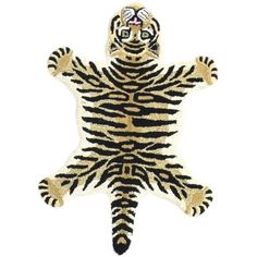 an animal rug with a tiger pattern on it's back and legs, in the shape of a man