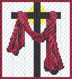 a cross with a red scarf hanging from it