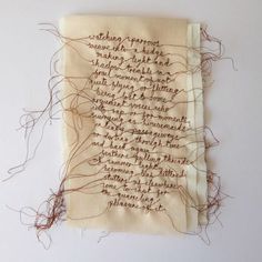 a piece of cloth with writing on it