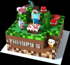 an image of a cake made to look like a minecraft farm scene with animals