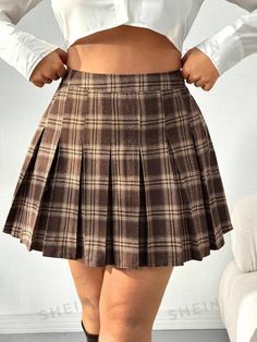 Style:Casual \nType:Pleated \nDetails:Pleated \nDetails:Zipper \nColor:Brown \nPattern Type:Plaid \nWaist Line:High Waist \nLength:Mini \nTemperature:Spring/Fall (18-25℃/63-77℉) \nFit Type:Regular Fit \nFabric:Non-Stretch \nMaterial:Woven Fabric \nComposition:100% Polyester \nCare Instructions:Machine wash or professional dry clean \nSheer:No \n Plus Size Plaid Skirt, Brown Plaid Skirt, Plaid Print Skirt, Punk Woman, Printed Pleated Skirt, Plus Size Vintage, Skirt Patterns Sewing, Plaid Mini Skirt, Plus Size Skirts