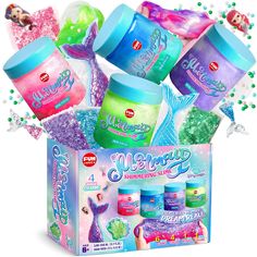 mermaid themed bath products in a gift box with streamers and confetti on the side