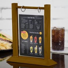 a menu board sitting on top of a table