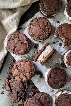 chocolate cookies and ice cream sandwiches on a baking sheet