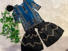 Color.       Zinc blue, black Embroidered beautiful Pakistani garara set comes in three piece(shirt, dupatta, garara) Could be best choice for eid, wedding or any formal occasions for your little princess. Pakistani Garara, Garara Suits Designs, Kids Frocks Design Sewing Patterns, Wedding Dresses For Kids, Kids Frocks Design, Kids Frocks, Wedding Dresses For Girls, Suit Designs, Wedding With Kids