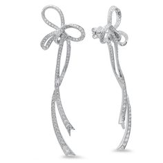 Long Bow Earrings The Atame Collection is the physical embodiment of the liaison between lovers; totally attached, very fluid and romantic. “Atame” meaning “tie me up” in Spanish, is all about lovers sharing a life, while equally being tied up in one another. 18-karat white gold earrings Set with 3.38 ctw white diamonds Measurements 2.4 cm wide by 7.7 cm long Brilliant Cut Color: H-G Clarity: VS1-VS2 Conflict free diamonds Ships Immediately Gold Earrings Set, Long Bow, Jewelry Design Drawing, Ribbon Jewelry, Diamond Bows, Jeweled Earrings, Bow Jewelry, Bow Earrings, White Gold Earrings