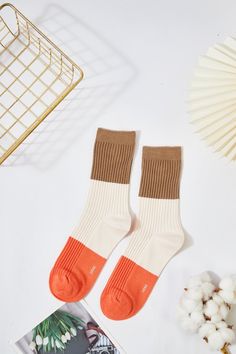 Materials: 80% Combed Cotton, 15% Polyamide, 5% Elastane. Size: Medium US Shoe Size Women 5-10 / Men 5-8.5 Thickness: Medium Weight: 1.5 oz These socks feature a trendy and playful color-blocking design with a soft ribbed texture that provides both comfort and style. Each pair combines two complementary or contrasting colors, creating a bold statement that elevates any outfit. Made from a soft, breathable fabric blend, these socks offer a snug fit perfect for daily wear, whether you're lounging Beige Stretch Cotton Socks, Stretch Cotton Socks In Beige, Stretch Beige Cotton Socks, Comfortable Beige Mid-calf Socks, Beige Mid-calf Socks For Fall, Mid-calf Beige Socks For Fall, Comfortable Brown Mid-calf Socks, Trendy Beige Cotton Socks, Casual Brown Mid-calf Socks