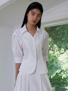 Composition : COTTON 100%Color : WHITECountry of Origin : KOREA White Fitted Feminine Shirt, Fitted Feminine White Shirt, White Fitted Shirt For Day Out, Fitted White Shirt For Day Out, Fitted White Shirt For Spring, White Fitted Spring Shirt, Fitted White Spring Shirt, Feminine White Relaxed Fit Shirt, White Relaxed Fit Feminine Shirt