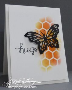 a close up of a card with a butterfly on it