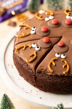 a cake with chocolate frosting and decorations on it