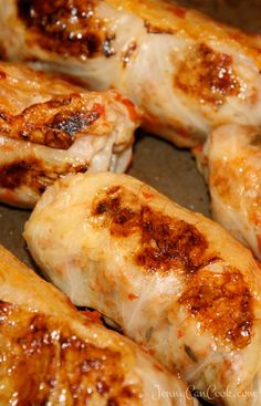 several pieces of chicken sitting on top of a pan