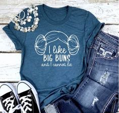 a shirt that says i like big buns and i cannot't lie on it