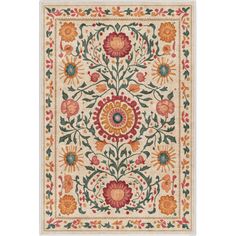 a rug with flowers and leaves on it