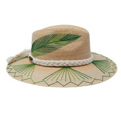 The wait is over! This hat is Ready to Ship and your order will be processed and shipped within 3-7 business days. Items with embroidery customization will be shipped within 2 weeks. Natural Palm Wide Brim Hat with Complex Eye/Fan Design (Green) by Corazon Playero. Custom designed and hand made hats by artisans in San Jose Del Cabo, Mexico. These hats are one size fits most with an elastic band inside to add comfort and fit for all head sizes. Please note, all hats come with natural braid unless custom braid is purchased. Green Feather, San Jose Del Cabo, Feather Hat, I Love The Beach