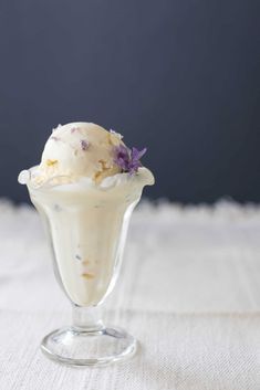 Creamy lavender ice cream is naturally sweetened with honey and boasts a lovely, light, floral flavor of fresh lavender flowers. It's the ultimate summer evening ice cream, so I know you’ll love this refreshing and delicate recipe. #farmhouseonboone #lavendericecream #honeylavendericecream #homemadeicecream