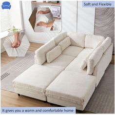 a living room with white furniture and a person taking a selfie in the mirror