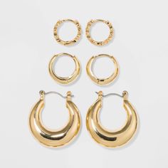 Three-piece gold-tone earring set with hoop designs in varying sizes and finishes. Easy to slip into pierced ears, with nickel-free metal being compatible for most skin types. Gender: female. Age Group: adult. Hoop Earring Set, Eighth Grade, Hoop Earring Sets, Hoop Earrings Small, Stud Earrings Set, Jewelry Inspo, Sterling Silver Studs, Sterling Silver Earrings Studs, Ear Jewelry