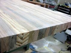 a close up of a wooden table in a room