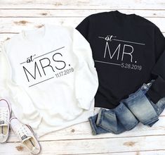 two sweatshirts with mr and mrs on them next to some jeans, shoes and sneakers