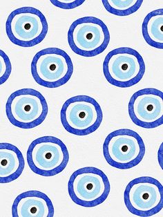 an abstract blue and white background with circles in the shape of eyeballs on it