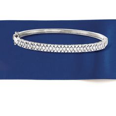 Ross-Simons - .75 ct. t. w. Diamond Bangle Bracelet in Sterling Silver. 8". You'll love our glimmering diamond bangle! In polished sterling silver, it flashes and flickers with three rows of round diamonds, totaling .75 carats. Wear it to the office or to date night. Double-latch safety. Box clasp, diamond bangle bracelet. Diamond birthstones are the perfect gift for April birthdays. Sparkling Sterling Silver Diamond Bracelet For Anniversary, Formal Sparkling Sterling Silver Diamond Bracelet, Dazzling Sterling Silver Diamond Bangle Bracelet, Formal Sterling Silver Sparkling Diamond Bracelet, Formal Sparkling Diamond Bracelet In Sterling Silver, Silver Cubic Zirconia Bangle With Pave Setting, Diamond White Sterling Silver Bracelet With Pave Setting, Sterling Silver Bangle Bracelet With Pave Setting, Sterling Silver Diamond Accent Bangle Bracelet