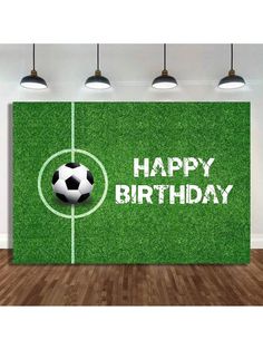 a soccer field with the words happy birthday on it and a soccer ball in the center