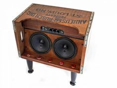 an old fashioned wooden box with speakers inside