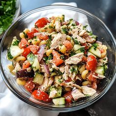 Mediterranean Tuna Salad combines tuna, olives, cucumbers, tomatoes, and feta cheese, tossed in a lemony dressing for freshness. Seared Tuna Salad, Lemony Dressing, Tuna Cucumber, Tomatoes And Feta Cheese, Mediterranean Tuna Salad, Tomatoes And Feta, Pickled Olives, Tuna Salad Pasta