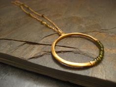 Crescent Pendant With Olive Green Idocrase Vermeil and - Etsy Gold Necklace With Hand Wrapped Round Beads, Gold Wire-wrapped Circular Jewelry, Gold Wire Wrapped Circular Jewelry, Gold Wire Wrapped Jewelry In Circle Shape, Deep Olive Green, Spike Bracelet, Onyx Bead, Circle Necklace, Green Bead