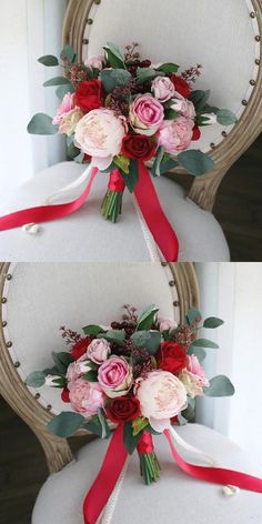 two chairs with flowers on them and red ribbons tied to the back of each chair