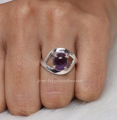 Amethyst Ring, 925 Sterling Silver Ring, February Birthstone Ring, Oval Gemstone Ring, Women Silver Ring, Handmade Jewelry, Anniversary Gift Gemstone Name- Amethyst  Stone Quality - AAA  Weight - 3.93 gm  Length - 1.5 cm  Width - 2 cm  Stone Shape - As shown in the picture Ring Size - All Ring Size Available  We serve complete 925 sterling silver Jewelry and genuine properties of the stone.  The products are dispatched from the small business from UK. Product Quality and Packaging - Our all products are 925 Silver Stamped which shows that the product is genuine and authentic .The products are dispatched from the small business from UK so you get the product on time and the product packaging comes in bubble foil wrap with all the precautions taken primarily that your product reaches you wit Oval Amethyst Crystal Ring For Anniversary, Fine Jewelry Amethyst Oval Ring, Silver Amethyst Ring With Round Accent Stones, Sterling Silver Amethyst Ring With Accent Stones, Silver Amethyst Ring With Oval Accent Stones, Purple Oval Cabochon Hallmarked Ring, Oval Amethyst Gemstones For Promise Rings, Oval Amethyst Crystal Ring With Accent Stones, Oval Amethyst Promise Ring With Stone Setting