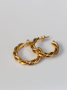 14k gold filled hoops twisted design Approximately 1” A perfect everyday size! Twisted Gold Hoop Earrings, Modern Twist Gold Plated Twisted Jewelry, Everyday Jewelry With Modern Twisted Style, Everyday Twisted Modern Jewelry, Twisted Yellow Gold Hoop Earrings For Everyday, Everyday Twisted Yellow Gold Hoop Earrings, Everyday Yellow Gold Twisted Hoop Earrings, Everyday Twisted Yellow Gold Jewelry, Twisted Yellow Gold Jewelry For Everyday