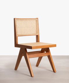 a chair made out of wood and wicker with a seat on the back side