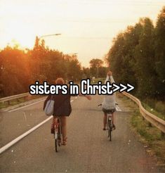 two people riding bikes down a road with the words sisters in christ above them