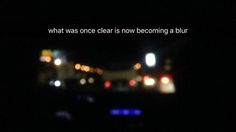 blurry image of street lights at night with text that reads, what was once else as now becoming a blur