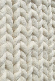 the texture of a blanket is white