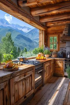 a kitchen with wooden cabinets and mountains in the background at this rustic cabin style home