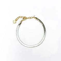 Whether it’s paired with a stack of silver cuffs or a group of gold bangles, the Kassie Link and Chain Bracelet in Mixed Metal is sure to add an extra touch of shine to your wrist stack and makes your styling options truly endless. Metal: 14K Gold and Rhodium Over Brass Size: 6.5"L With 1.5"L Extender Due to the one-of-a-kind nature of the medium, exact colors and patterns may vary slightly from the image shown. Wrist Stack, Wrist Stacks, Giddy Up Glamour, Silver Cuff, Gold Bangles, Kendra Scott, Chain Bracelet, Sale Items, Bangles