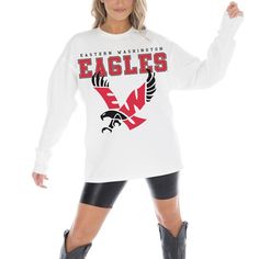 Embrace Eastern Washington Eagles spirit in ultimate comfort with this Gameday Couture Big Goals Long Sleeve T-Shirt. The oversized fit and dropped shoulders create a casual, comfy look that's perfect for game day or any day. Plus, the midweight fabric makes it ideal for layering as the weather cools down. Oversized Sporty T-shirt For Fall, Oversized Long Sleeve Athleisure T-shirt, Graphic Print Drop Shoulder Tops For Loungewear, Drop Shoulder Graphic Print Tops For Loungewear, Fall Graphic Print Drop Shoulder Top, Relaxed Fit School Spirit T-shirt For Fall, Collegiate Oversized Top With Graphic Print, Oversized Collegiate Top With Graphic Print, Oversized Collegiate Cotton Top