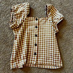 Pretty Gingham With Puff Sleeves And Button Front. Brand New With Tags Brown Summer Tops With Buttons, Brown Buttoned Tops For Summer, Brown Cotton Blouse With Button Closure, Brown Spring Top With Buttons, Fall Gingham Tops With Buttons, Brown Tops With Button Closure For Day Out, Brown Buttoned Blouse For Spring, Spring Brown Blouse With Buttons, Brown Buttoned Tops For Day Out