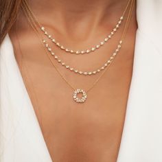 This 14k gold diamond by the yard necklace is a classic design, a must have piece for everyday wear and special occasions. M A T E R I A L & L E N G T H Available in 14k Yellow Gold, 14k Rose Gold, 14k White Gold Small Bezel Size: 3.5 mm Diamond size: 2 mm Stone: 23 Round Diamonds Carat Weight: 0.69 ct. tw. Large Bezel Size: 4 mm Diamond size: 2.3 mm Stone: 20 Round Diamonds Carat Weight: 1 ct. tw. Chain: Link Chain Chain Length: 14+2, 16+2, 18+2 options or any length up to 20 inches without Kiara Bracelet, Elegant Jewelry Classy, Dimond Neckless Jewelry, Small Diamond Necklace, Diamond By The Yard, Diamond Chain Necklace, Layer Chain, Dainty Diamond Necklace, Diamond Necklace Designs