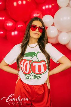 "Looking for a trendy sorority tshirt that'll last? 🫶🏻 This Alpha Omicron Pi Cherry Tee is the answer! Whether you're giving this tee as a gift or treating yourself with something new, you'll be obsessed with this sorority t-shirt! 🌊 YOU'LL LOVE THIS STYLE 🌊 Meet the Alpha Omicron Pi Cherry Tee - a dreamy sorority t-shirt! This classic tee is everyone's go-to. Soft, breathable fabric to be comfy all day long, and the bright white fabric goes with everything! Best part? The true-to-size, unis Summer Streetwear T-shirt With School Spirit, Spring School Spirit T-shirt For Streetwear, Spring School Spirit Streetwear T-shirt, Spring Streetwear T-shirt With School Spirit Style, White Crew Neck Sorority T-shirt, Spring School Spirit T-shirt With Screen Print, Trendy College T-shirt For Spring, White Sorority Graphic Print T-shirt, Sorority Cotton T-shirt For Spring