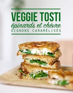 two sandwiches stacked on top of each other next to a cup of coffee with the words veggie toast equandos et chevre